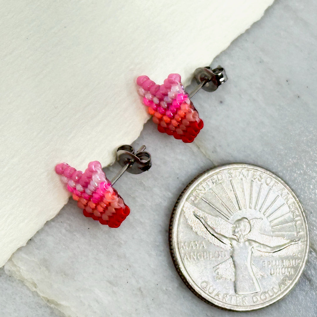 Pair of Chevron Beaded Earrings with Stainless Steel Studs, handmade in Montana USA by Aurum Shimmer (coral sunset), with scale