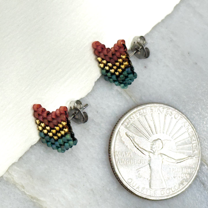 Pair of Chevron Beaded Earrings with Stainless Steel Studs, handmade in Montana USA by Aurum Shimmer (teal, gold, mauve), with scale