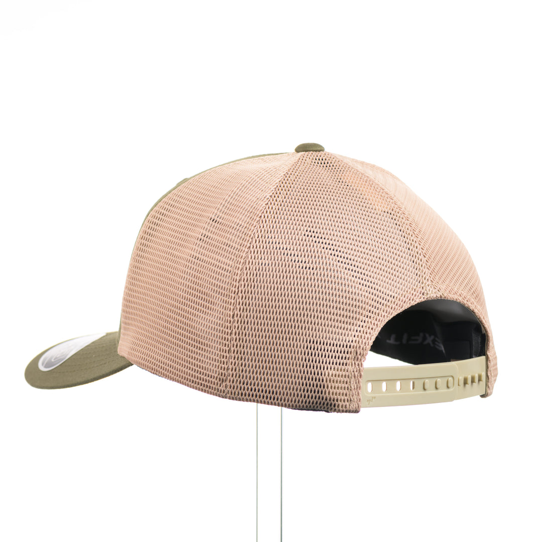 The back of an olive green and khaki mesh flexfit trucker hat with a bison flexwood hexagon patch.