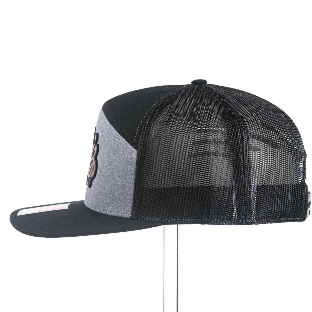 Black and gray mesh cap with a leather Griz patch on a white background