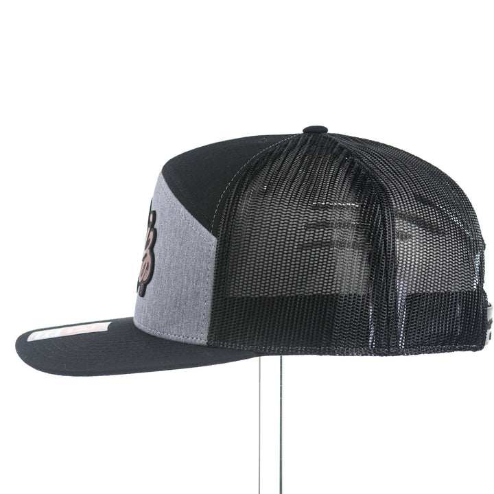 Black and gray mesh cap with a leather Griz patch on a white background