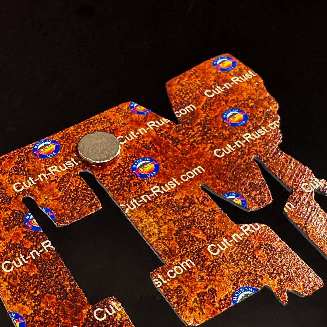 A made in Montana MT and state shaped magnet with a full color map printed on it. Featuring a strong backed magnet.