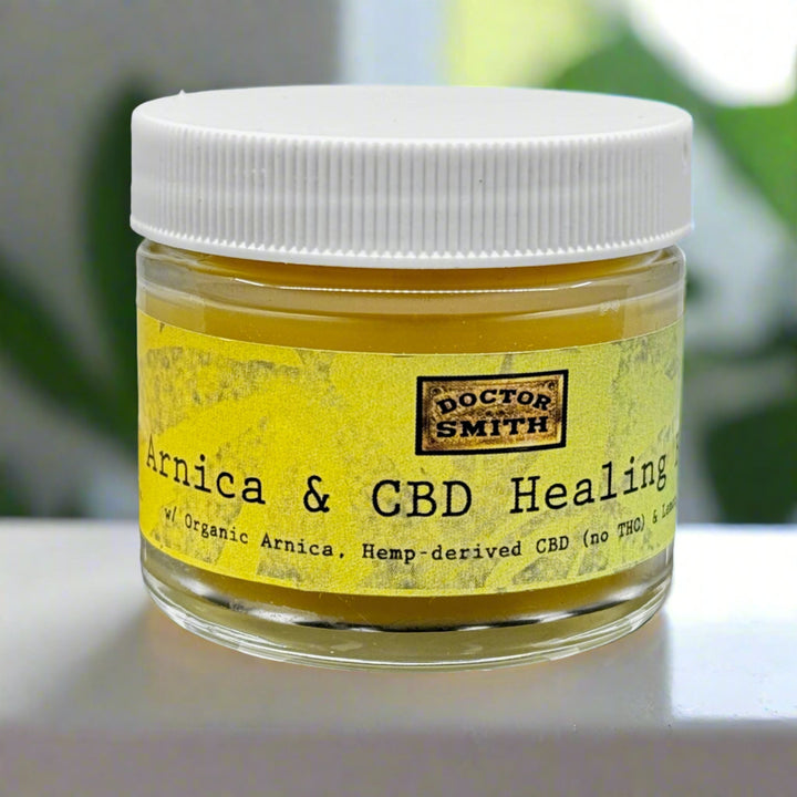 2 oz. jar of Dr. Smith Botanicals Arnica and Hemp Healing Balm (lemongrass), CBD and arnica healing balm handcrafted in small batches in Montana, USA