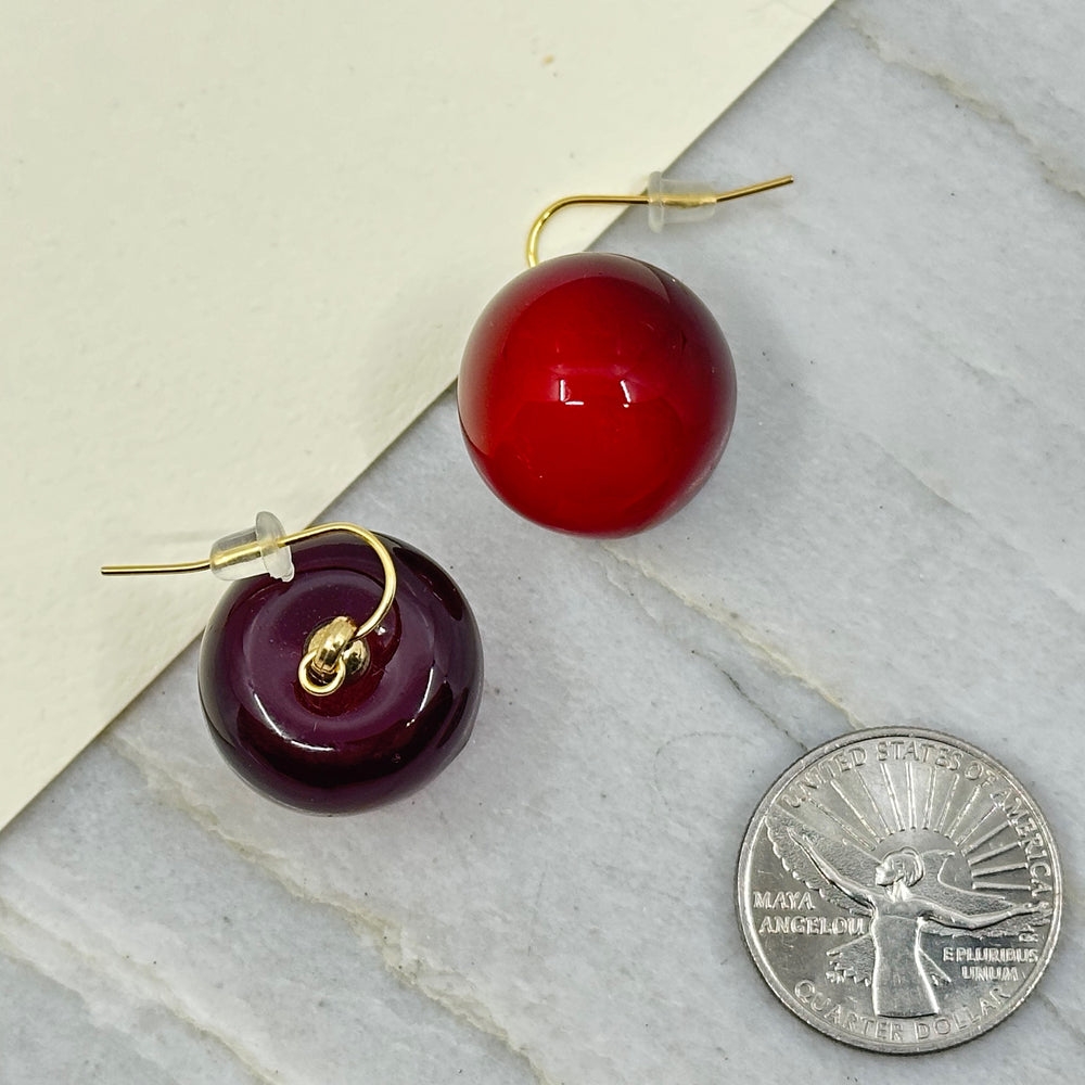 Pair of Flathead Cherry Earrings with 14K Gold Plated Wires made in Montana by Woodland Goth Creations, scale