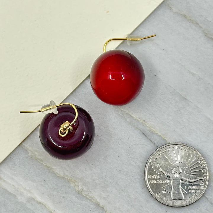 Pair of Flathead Cherry Earrings with 14K Gold Plated Wires made in Montana by Woodland Goth Creations, scale