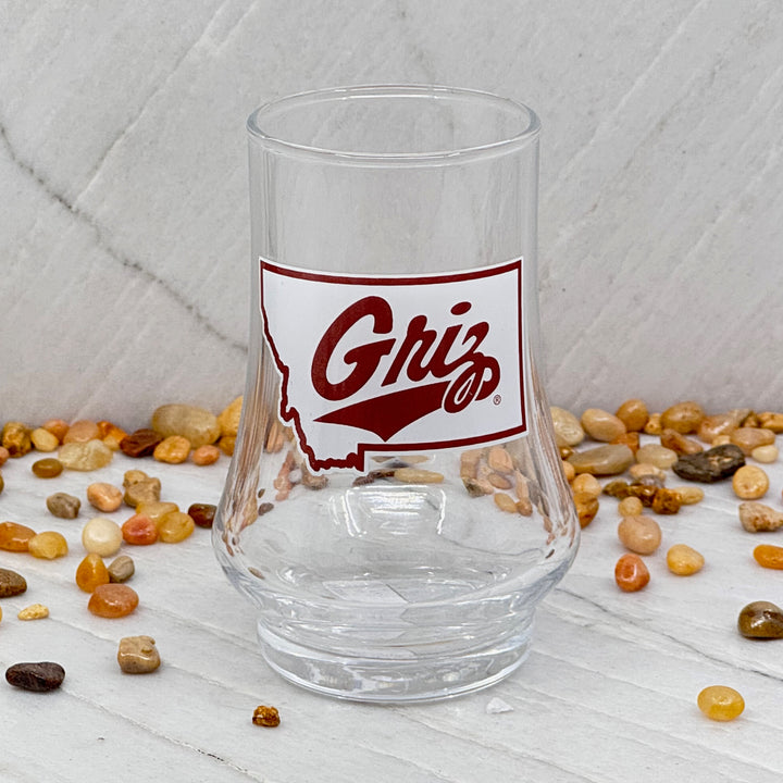 Blue Peak Creative's Montana Grizzlies Glen Cairn Whiskey Glass - Glen Cairn Whiskey Glasses decorated with University of Montana Griz Script over Montana, front