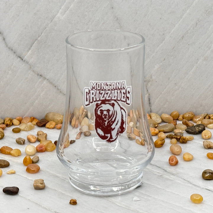 Blue Peak Creative's Montana Grizzlies Glen Cairn Whiskey Glass - Glen Cairn Whiskey Glasses decorated with Montana Grizzlies Charging Bear, front
