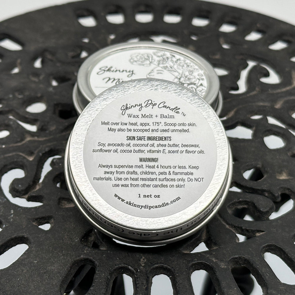 1 oz. tin of Skinny Dip Candle's Champagne Lotion + Candle, description & ingredients