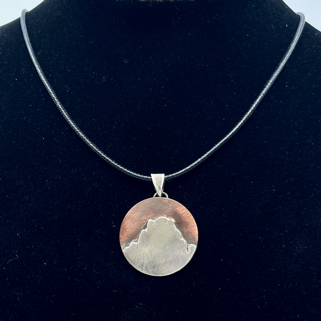 Bull & Bear's Copper and .925 Sterling Silver Montana Mountain Pendant, featuring Two Medicine Peak, on a black cord
