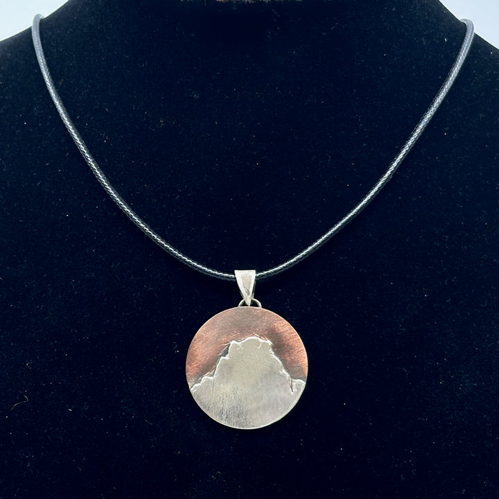 Bull & Bear's Copper and .925 Sterling Silver Montana Mountain Pendant, featuring Two Medicine Peak, on a black cord