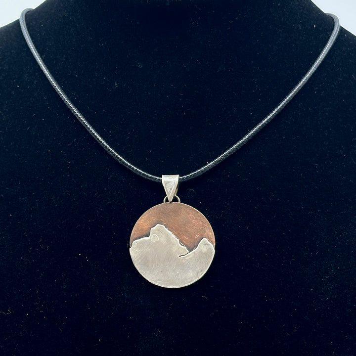 Bull & Bear's Copper and .925 Sterling Silver Montana Mountain Pendant, featuring Rainbow Peak, on a black cord