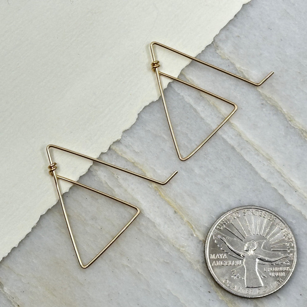 Pair of Bijou by Sam's 14K Gold Filled Mountain Earrings, with scale