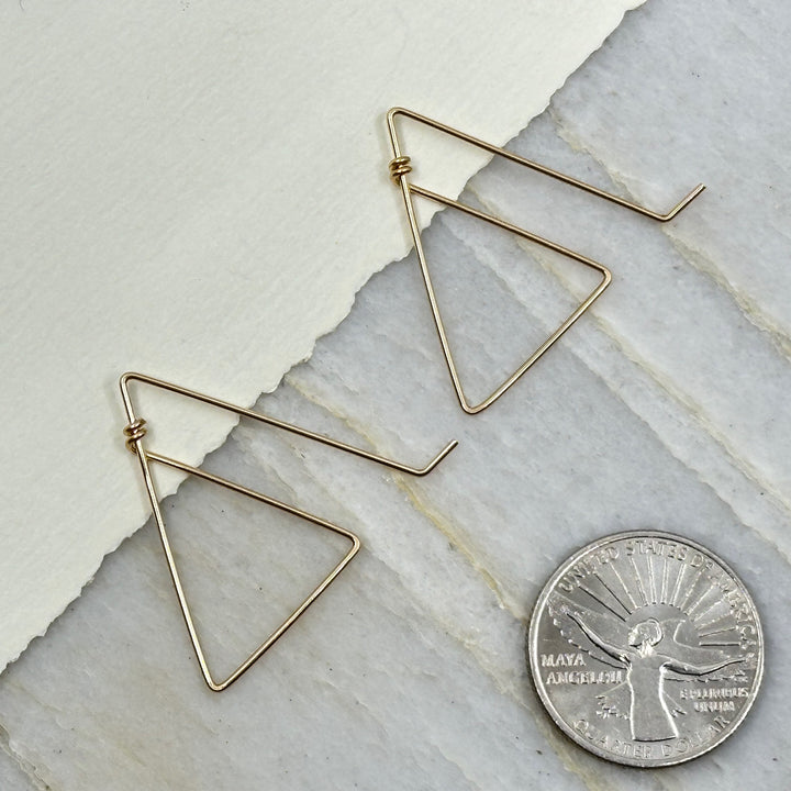 Pair of Bijou by Sam's 14K Gold Filled Mountain Earrings, with scale