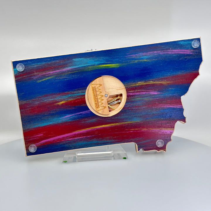 Knotty Pine Woodworks Handmade Montana Moose Cribbage Board Sunset (back)—this handmade wooden cribbage board is the perfect Montana-made gift for game lovers and adventurers. The back features a compartment for storing metal pegs.