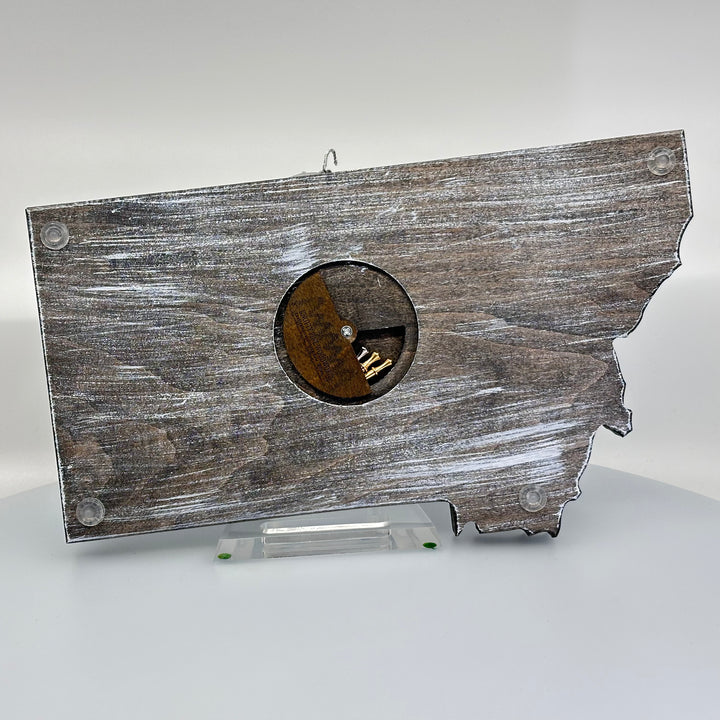 Knotty Pine Woodworks Handmade Montana Sasquatch Cribbage Board White/ Dark (back)—this handmade wooden cribbage board is the perfect Montana-made gift for game lovers and adventurers. The back features a compartment for storing metal pegs.