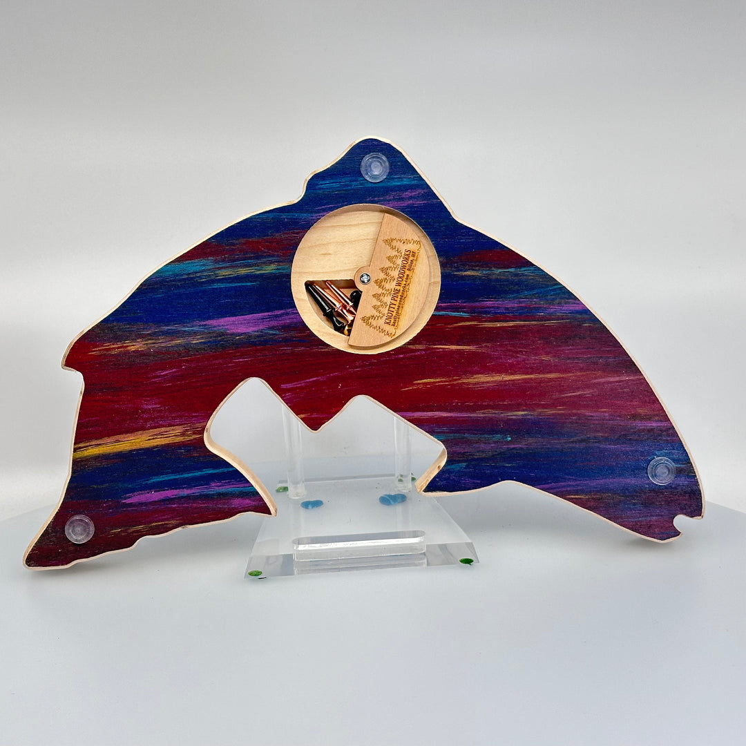 Knotty Pine Woodworks Handmade Trout Cribbage Board with Montana Mountain Scene Sunset (back)—this handmade wooden cribbage board is the perfect Montana-made gift for game lovers and fishers. The back features a compartment for storing metal pegs.