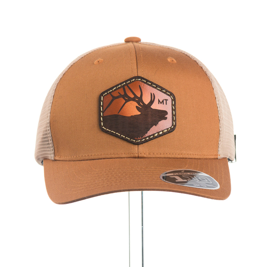 Brown trucker cap with an elk Leather Patch and 'MT' on a white background