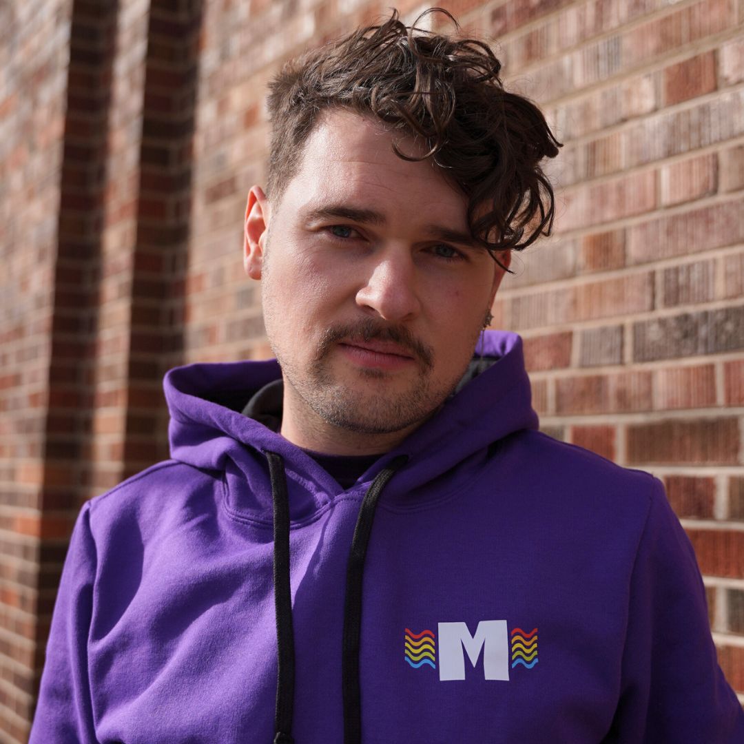 Missoula Pride 2025 Unisex Pullover Hoodie featuring the 2025 Missoula Pride design by local artist T.Lyle, designed and decorated in Missoula, MT, USA