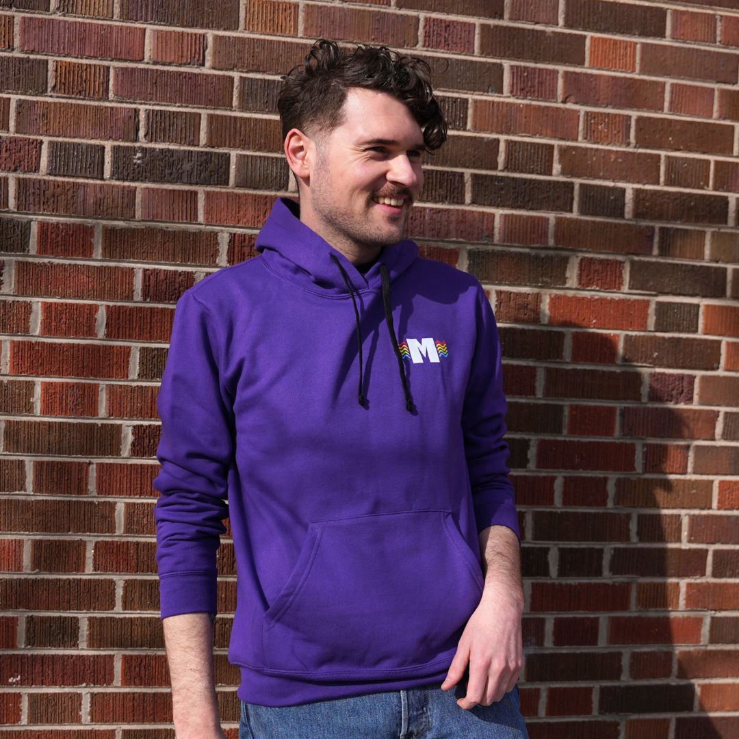 Missoula Pride 2025 Unisex Pullover Hoodie featuring the 2025 Missoula Pride design by local artist T.Lyle, designed and decorated in Missoula, MT, USA