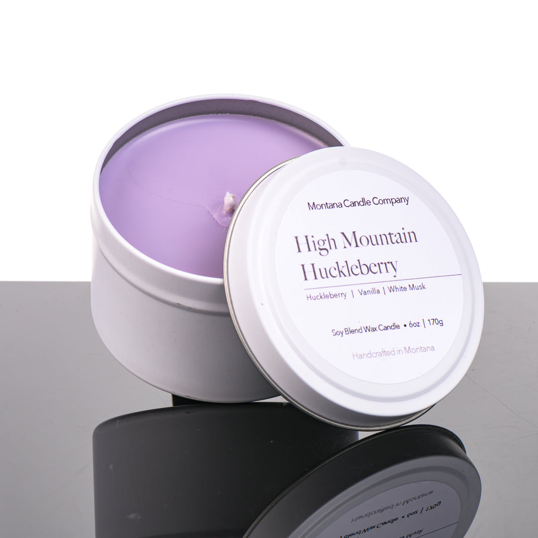 High Mountain Huckleberry Candle soy blend candle handmade in Missoula, Montana USA by Montana Candle Company, with a blend of Huckleberry, Vanilla, and White Musk, 6 oz. white tin