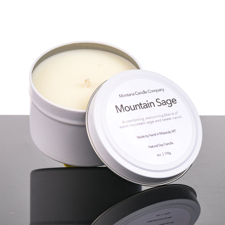 Welcome Mountain Sage Candle natural soy blend candle (with a sage and sweet neroli scent) in a 6 oz. tin, handmade in Montana USA by Montana Candle Company