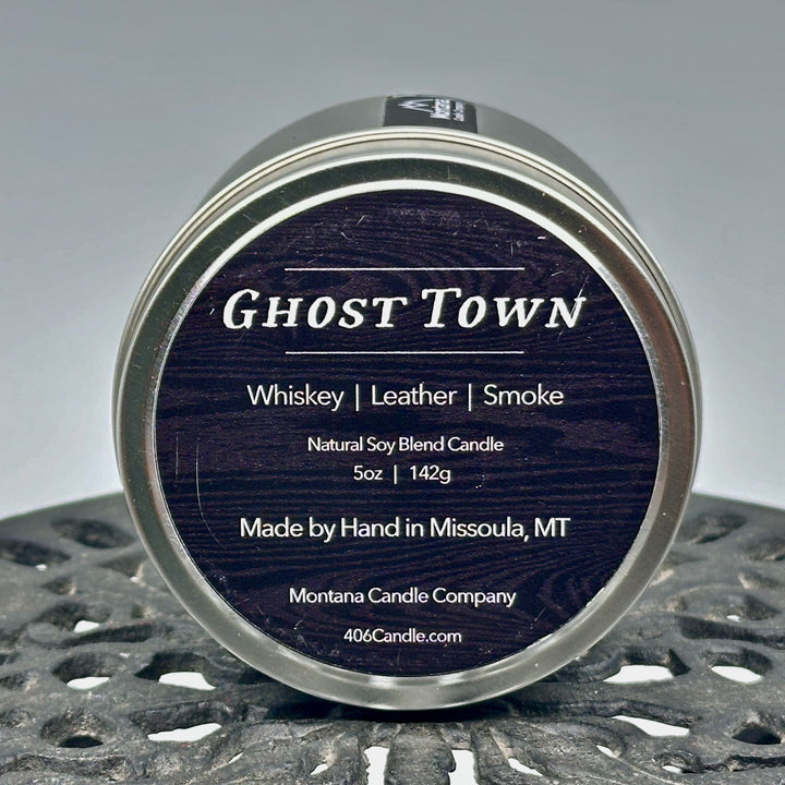 Ghost Town Candle soy blend candle handmade in Missoula, Montana by Montana Candle Company, with a blend of whiskey, leather, and smoke scents, in a 5 oz. tin