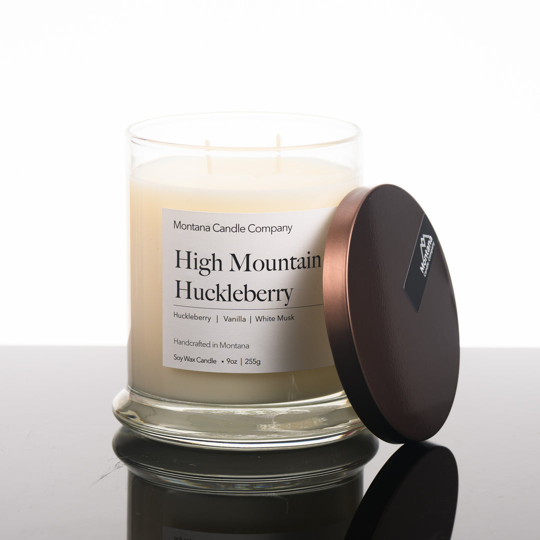 High Mountain Huckleberry Candle soy blend candle handmade in Missoula, Montana by Montana Candle Company, with a blend of Huckleberry, Vanilla, and White Musk, 9 oz. glass tumbler