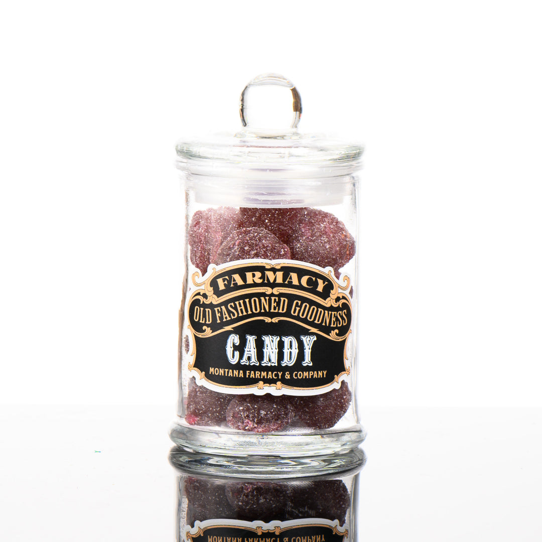 Montana Farmacy Old Fashioned Goodness Candy--Huckleberry Hard Candy--in a glass jar, front