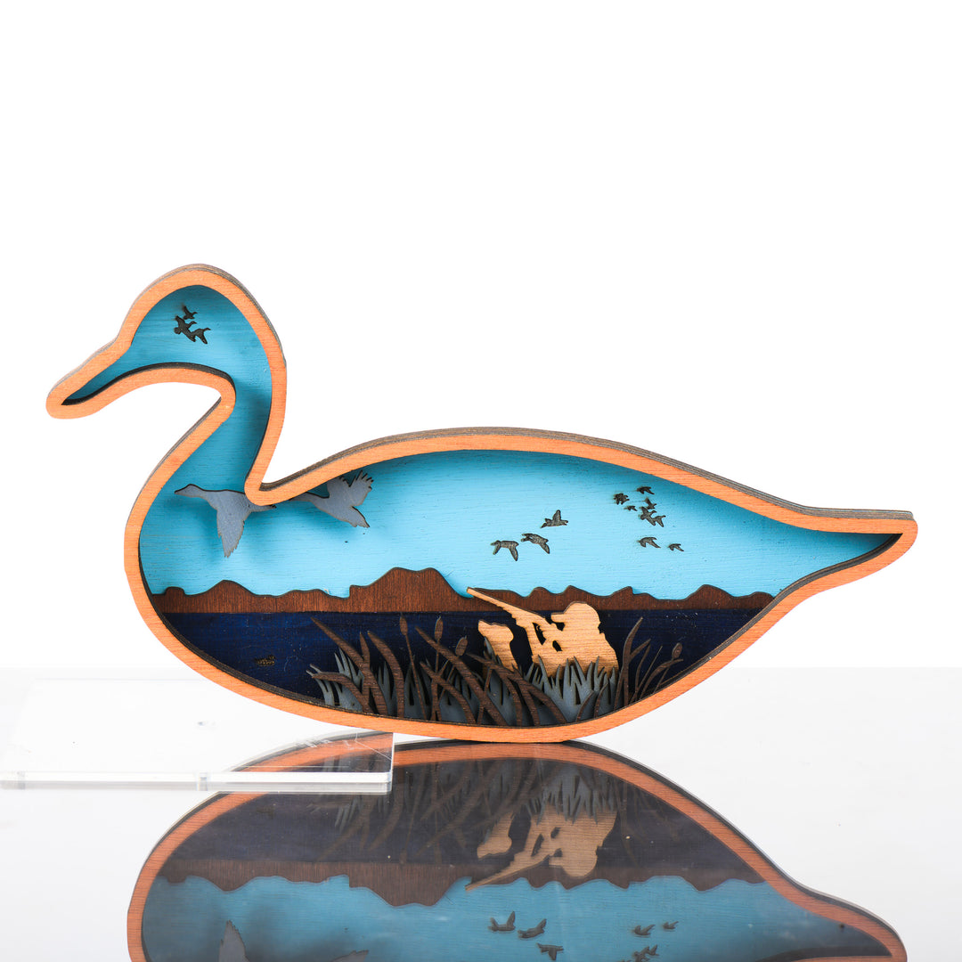 Duck 3D Layered Wood Art made in Montana by RJS Engraving & Design - laser-cut wood art depicting a duck hunting scene inside the silhouette of a duck, Standard size