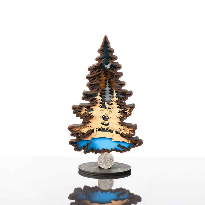 Tree 3D Layered Wood Art made in Montana by RJS Engraving & Design - laser-cut wood layers depict a forest and mountain within the silhouette of a tree, Mini w/ scale