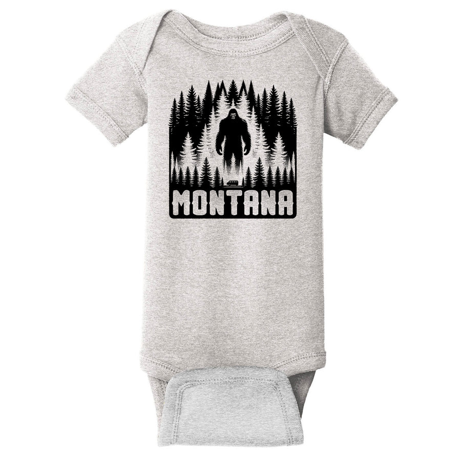 A heather grey inant onesie printed with a bigfoot design that says Montana