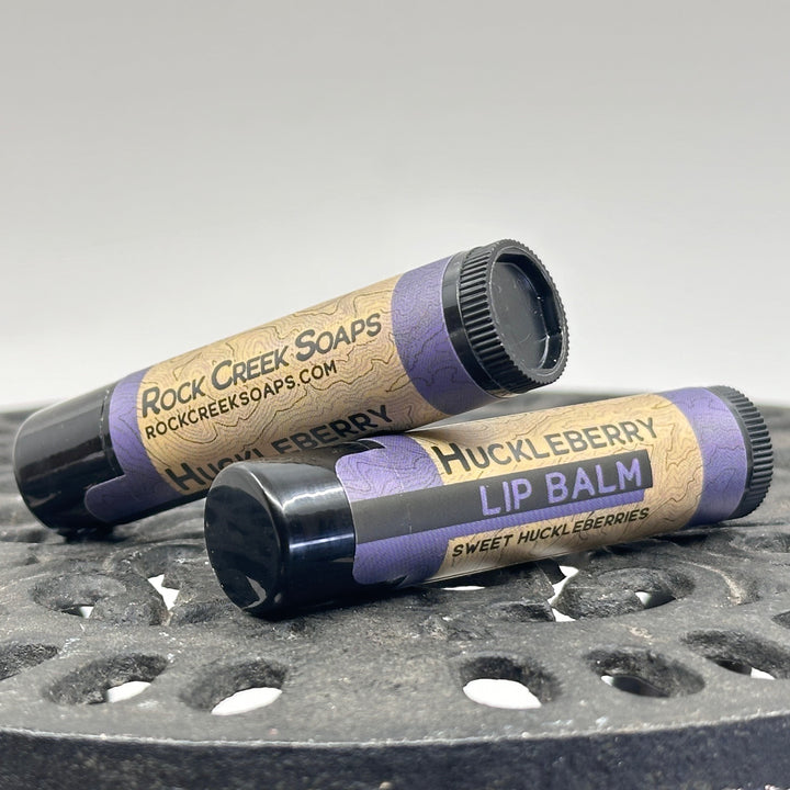 .15 oz. tube of Nourishing Natural Lip Balm, made in Montana by Rock Creek Soaps, available in assorted natural flavors (huckleberry)