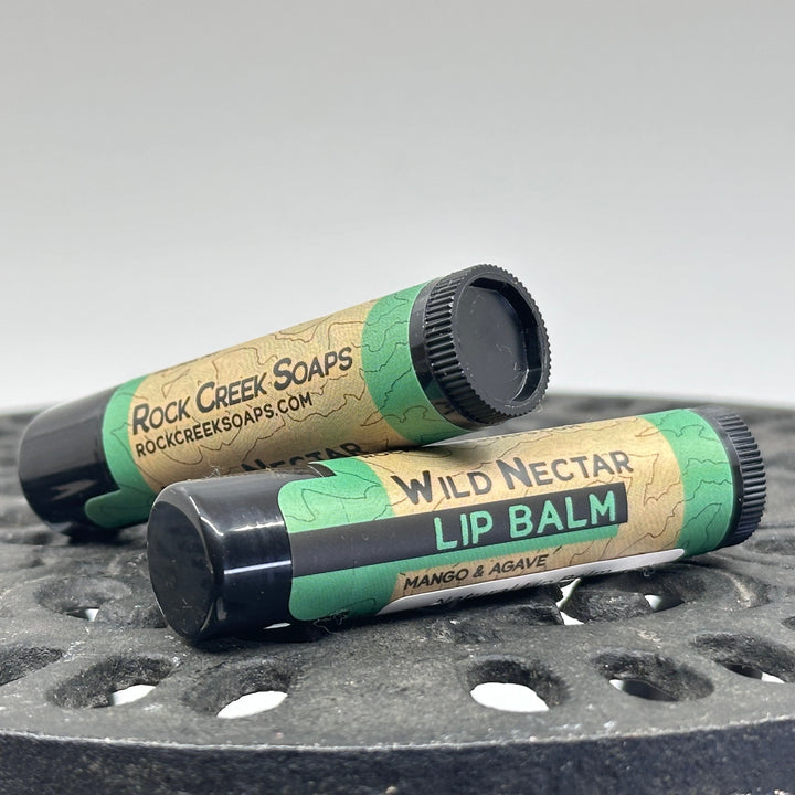 .15 oz. tube of Nourishing Natural Lip Balm, made in Montana by Rock Creek Soaps, available in assorted natural flavors - wild nectar (mango & agave)
