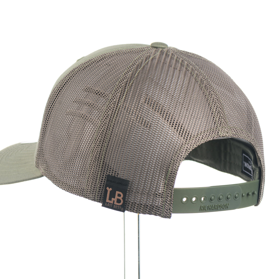 The back of a loden green Richardson 112 trucker hat
