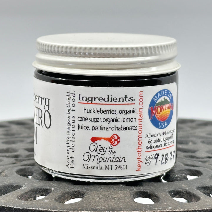 2 oz. jar of Key to the Mountain Huckleberry Habanero Jam, ingredients: huckleberries, organic cane sugar, organic lemon juice, pectin and habaneros