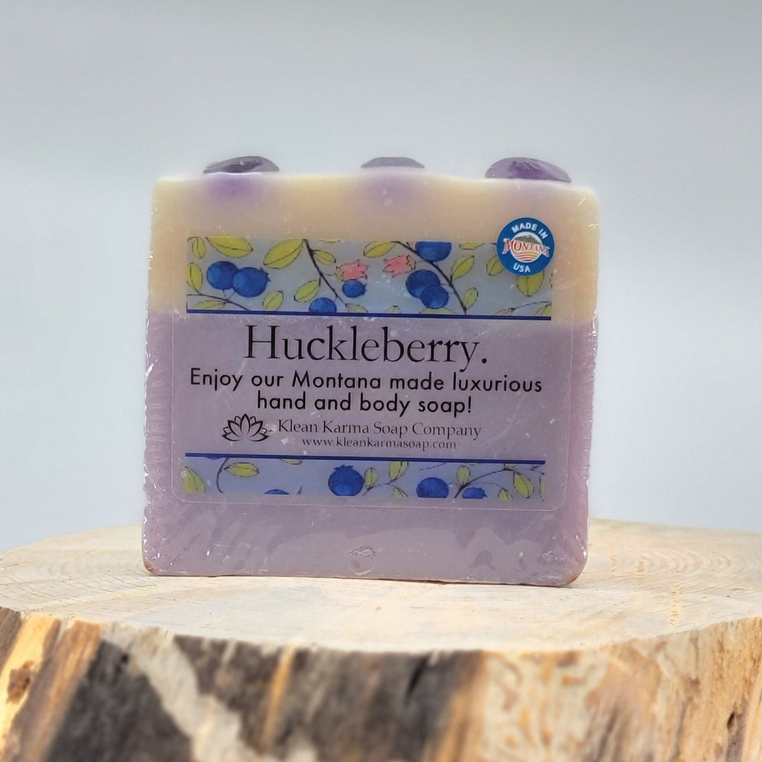 A purple bar of made in Montana luxury huckleberry soap