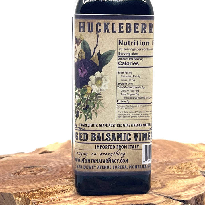 100 ml bottle of Montana Huckleberry Dark Aged Balsamic Vinegar, made in Montana by Montana Pharmacy