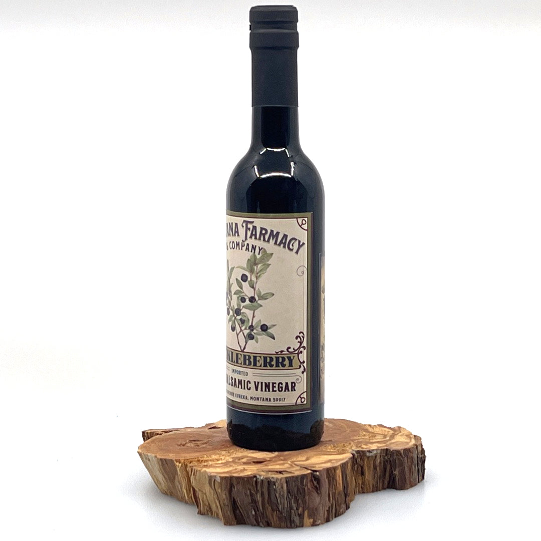 375 ml bottle of Montana Huckleberry Dark Aged Balsamic Vinegar, made in Montana by Montana Pharmacy