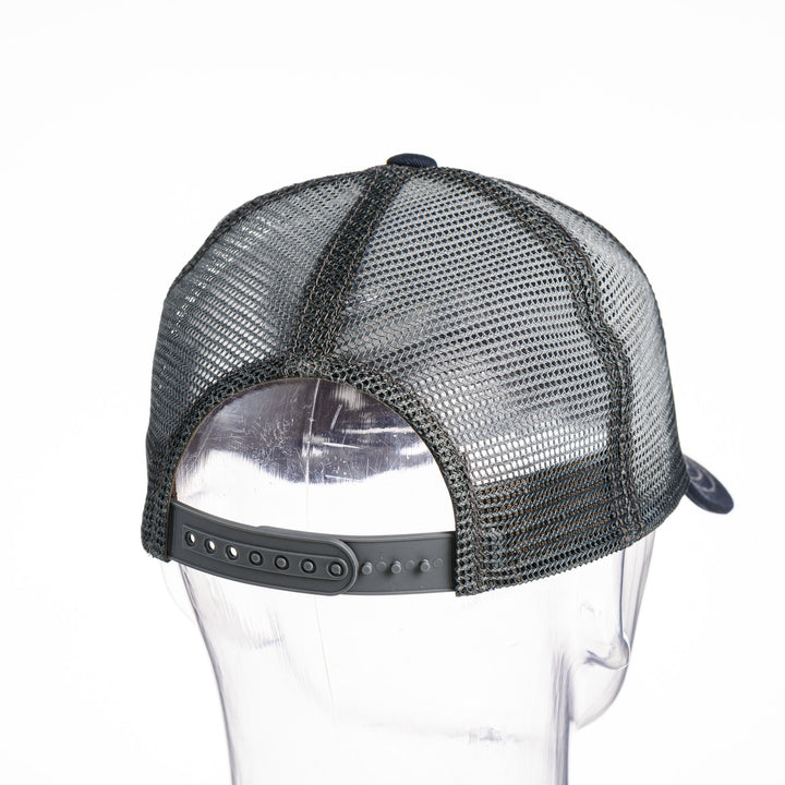 The back of a MSU cats trucker hat, showing the snapback closure.