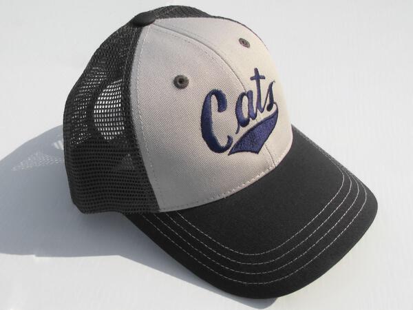 A table top shot of a made in Montana MSU Cats trucker Hat