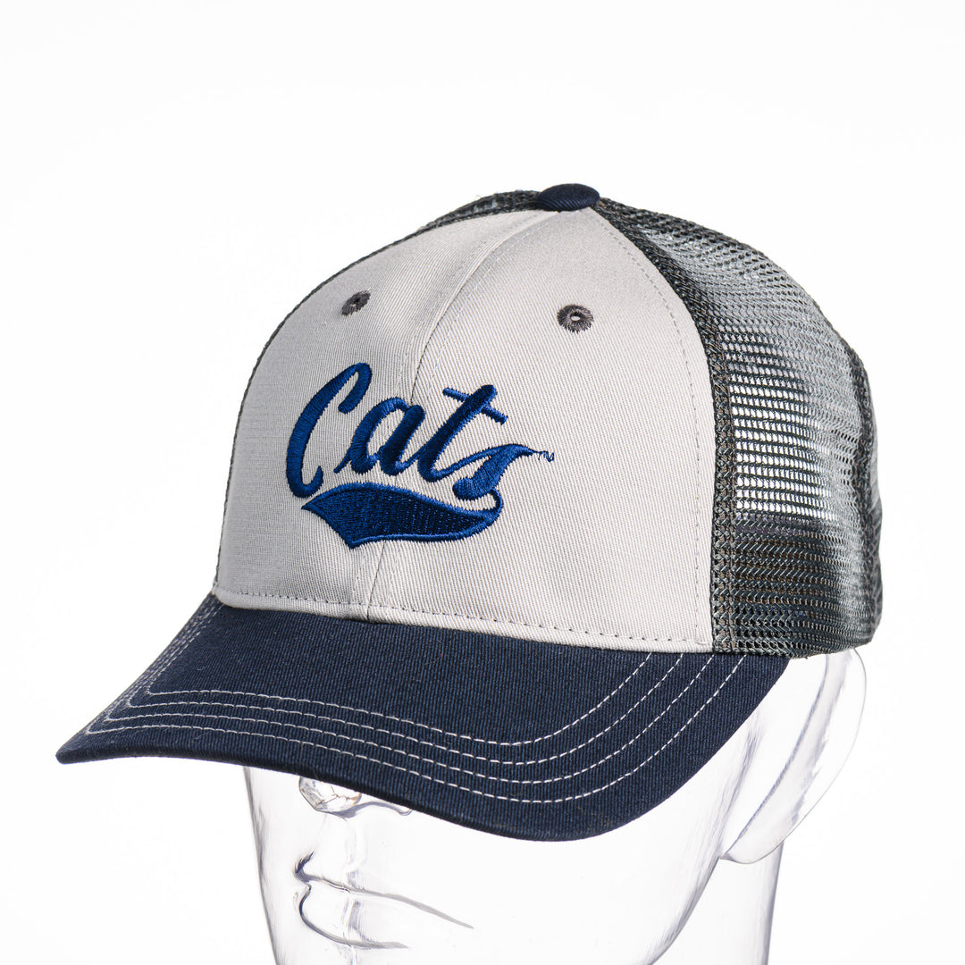 This tri-color trucker hat has a navy blue Montana State Cats script embroidered on the front. Made in Montana.