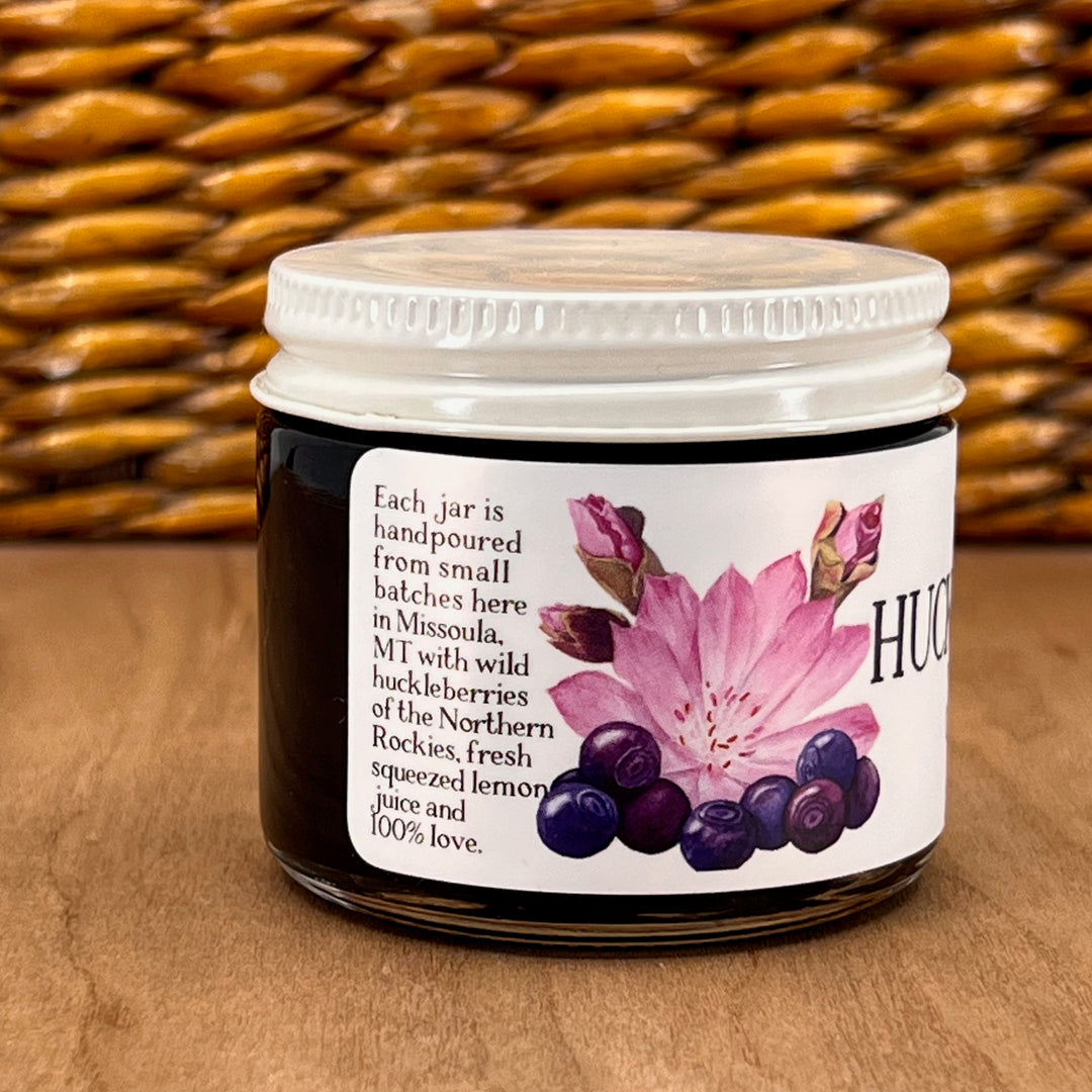 A 2oz jar of Key to the Mountain's, Montana handmade Wild Huckleberry Jam Reading each jar is hand poured from small batches here in Missoula, Montana with wild huckleberries of the northern Rockies fresh squeezed lemon juice and 100% love.