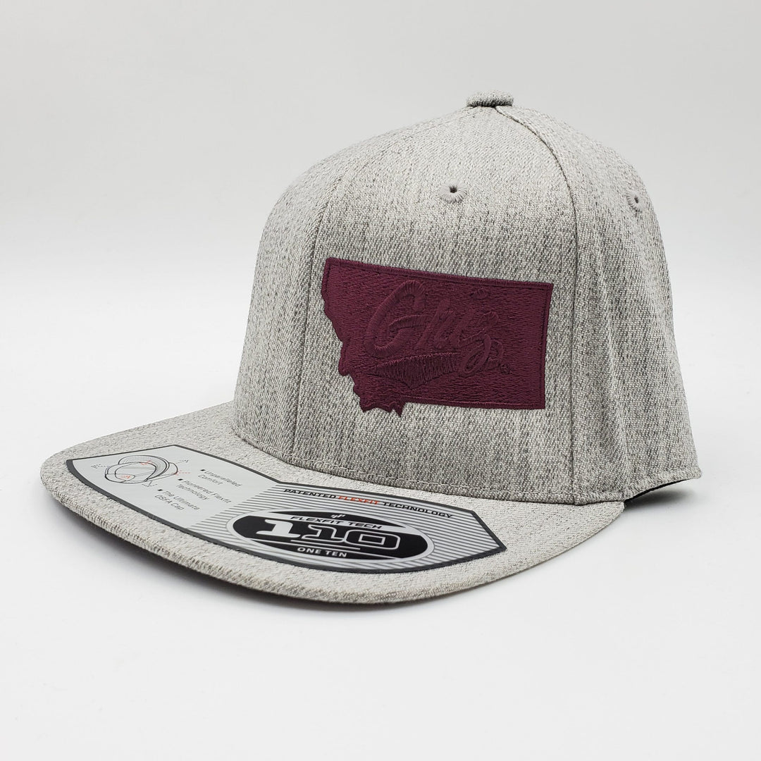 Blue Peaks Creative UM Grizzlies hat, Flexfit Montana Griz Script Flat Bill Hat, grey w/ maroon embroidery