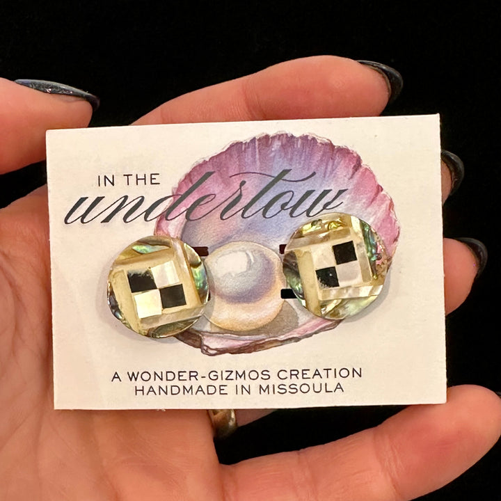 Artisan abalone cuff links on a card that reads Handmade in Missoula