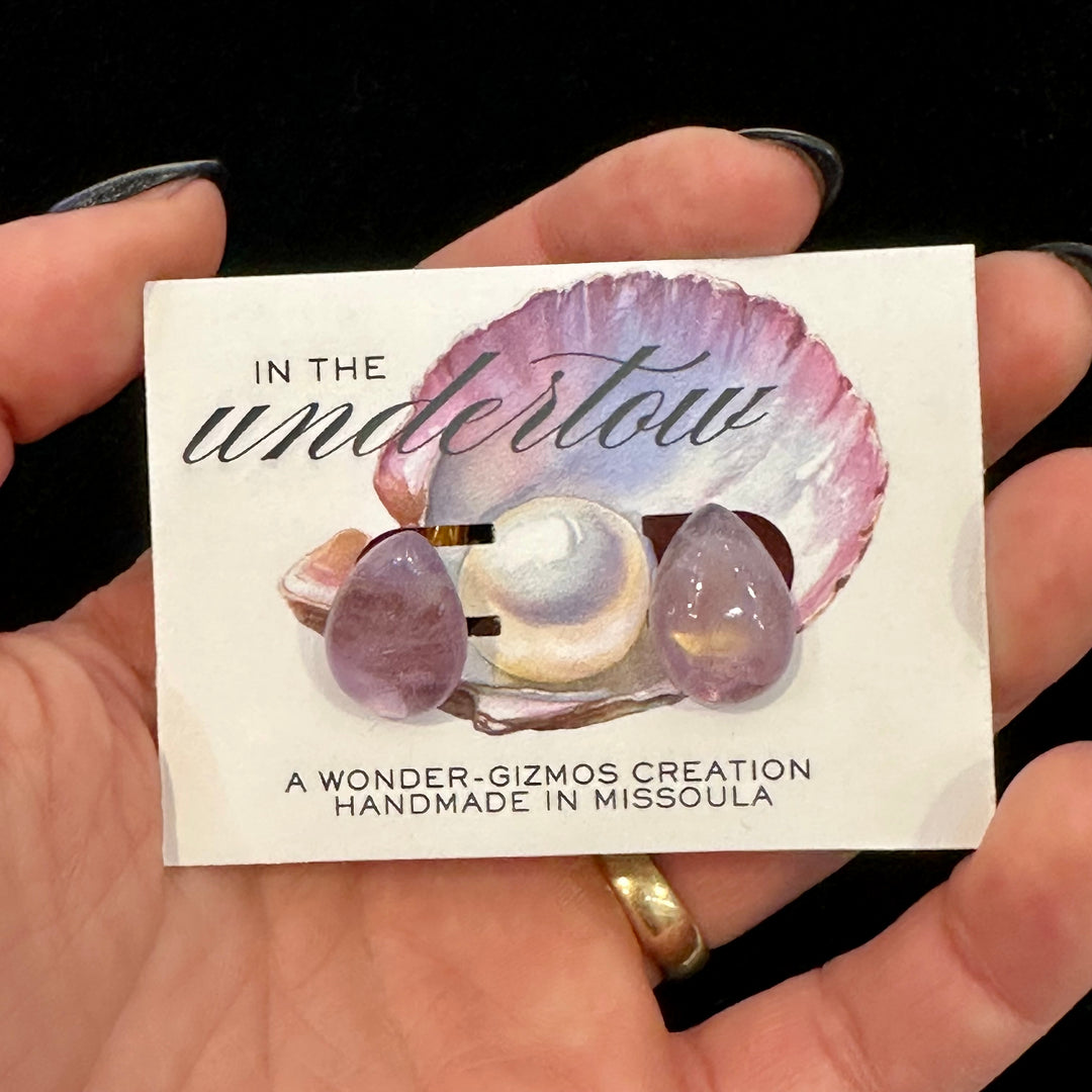 Amethyst cuff links on a card that reads Handmade in Missoula