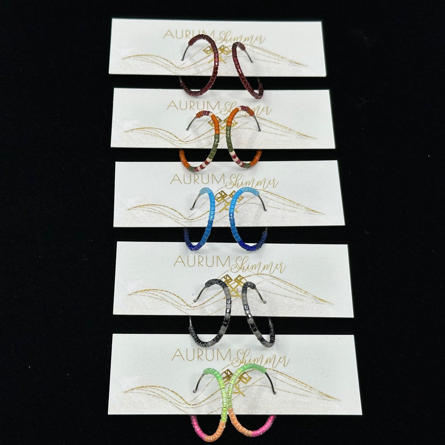 Five pairs of Beaded Stainless Steel Hoop Earrings (small), handmade in Montana USA by Aurum Shimmer, on cards