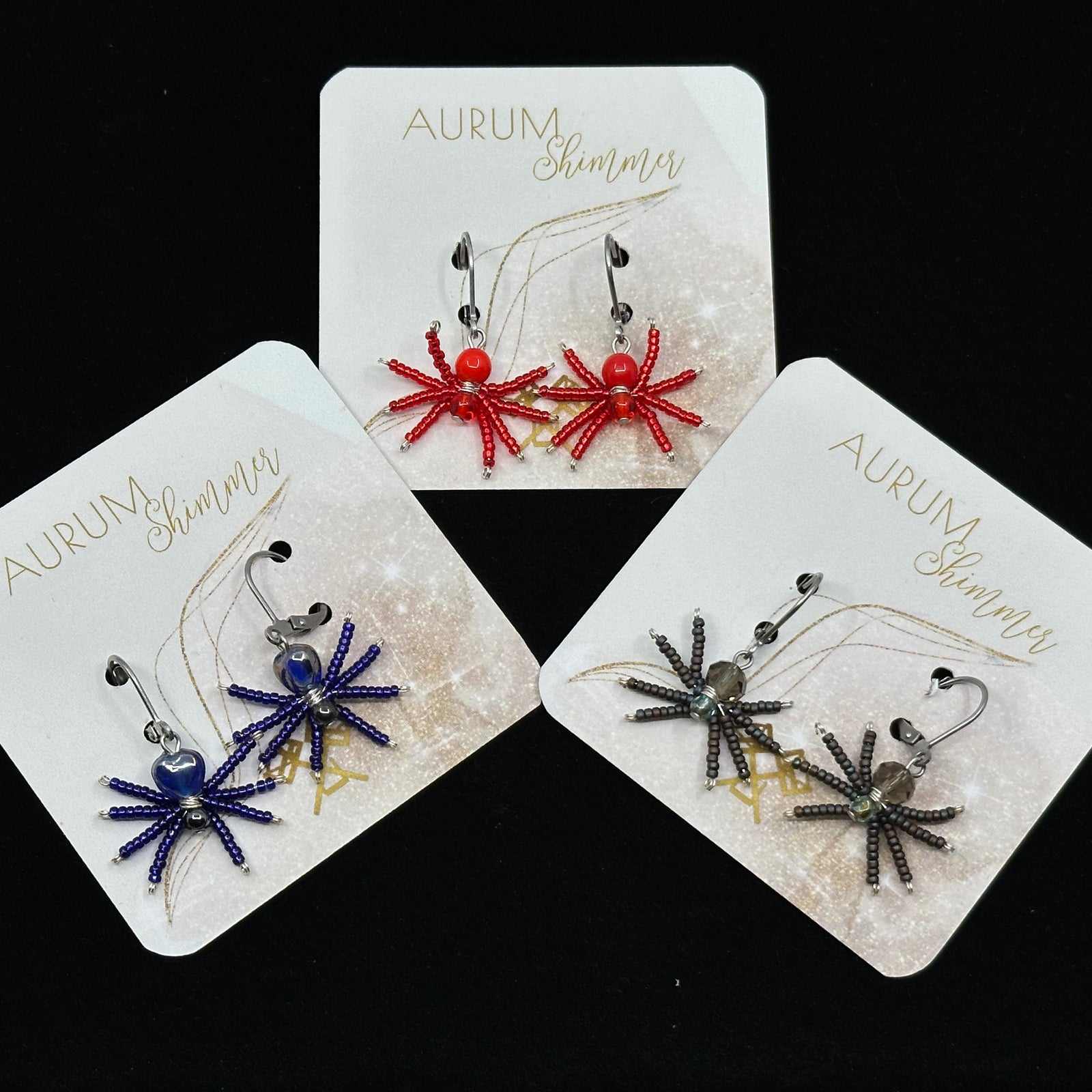3 pairs of Spider Beaded Earrings with Stainless Steel Lever Backs (assorted colors), handmade in Montana USA by Aurum Shimmer, on cards