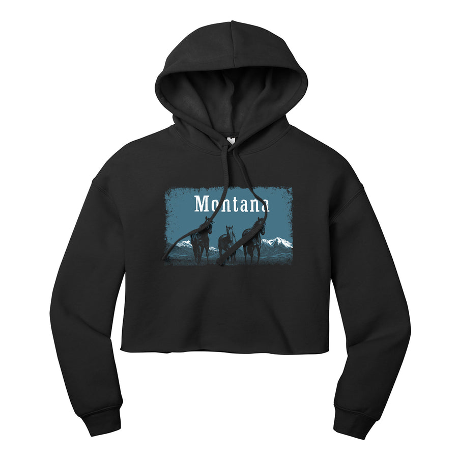 Black Ladies' Cropped Fleece Hooded Sweatshirt printed with the Wild Horses Montana design, by Blue Peak Creative
