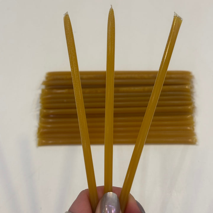 Three banana flavored honey sticks Made in Montana