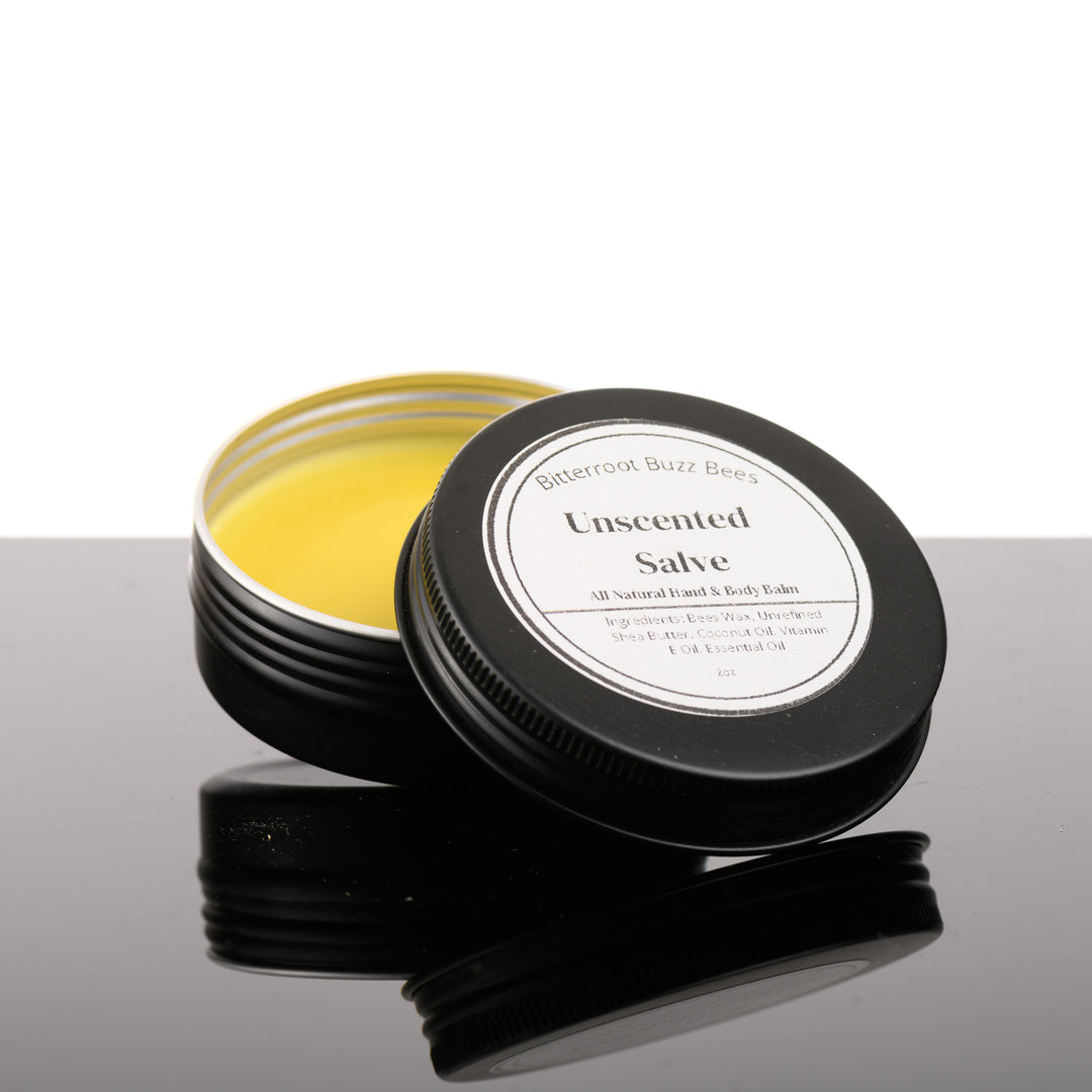 2 oz tin of Unscented Salve, made in Stevensville, Montana by Bitterroot Buzz Bees LLC, against a white background